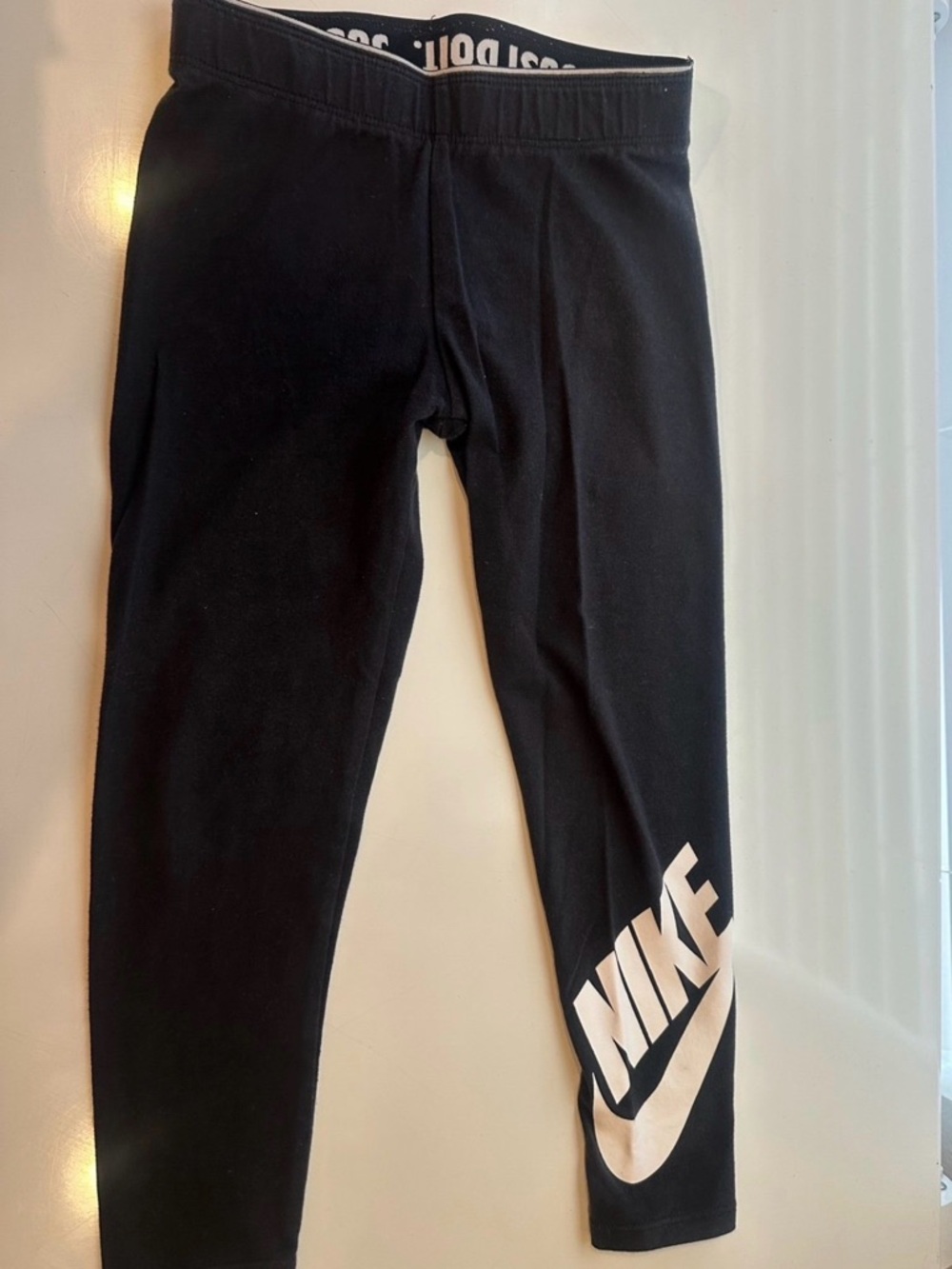 Nike Black Leggings with White Swoosh Logo